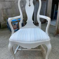 Sedia imbottita con braccioli antica