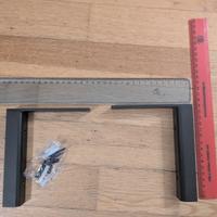 Coppia staffe L acciaio colore nero con tasselli