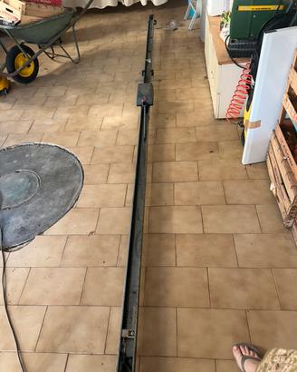 Binario dí scorrimento superiore basculante