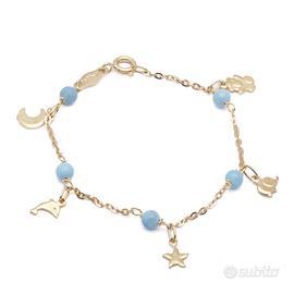 Bracciale con charms e pasta di turchese in oro