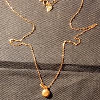 collana a in argento,con ciondolo in oro