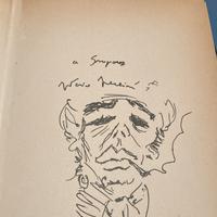 Federico Fellini caricatura autografa su libro