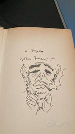 Federico Fellini caricatura autografa su libro