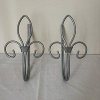 Coppia di ferma tende stile fleur-de-lis metallo