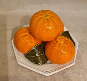 Centrotavola in ceramica con mandarini
