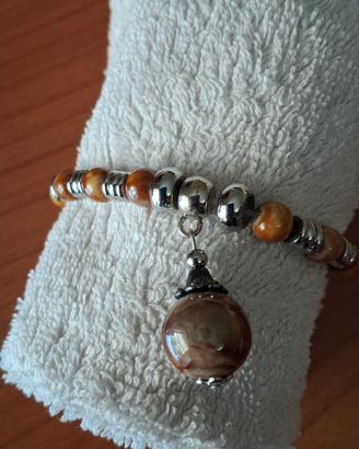 bracciale  AIRONE   acciaio e perle in ceramica  