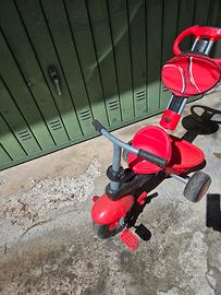Triciclo con maniglia 