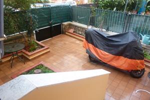 Appartamento con giardino e tre camere da letto