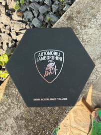 Trittico lamborghini e moneta campari