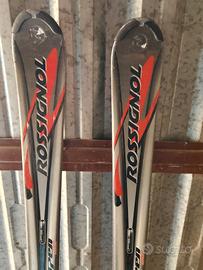 sci Rossignol con bastoncini Leki