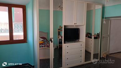 Armadio  7 ante con Vano TV e Cassettiera 