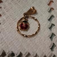 ciondolo in oro con coccinella 