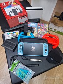 Nintendo Switch Oled con giochi e accessori