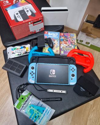 Nintendo Switch Oled con giochi e accessori