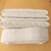 Fettuccia per tende più gancini