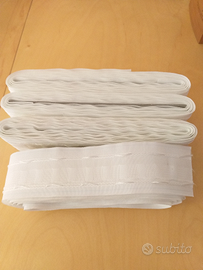 Fettuccia per tende più gancini