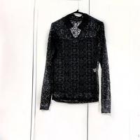 Delicata maglia camicia in pizzo nero.  - Tessuto