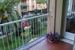 Quarto con due camere e balcone