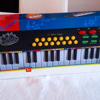 PIANOFORTE a TASTIERA ELETTRONICA con 32 tasti e..