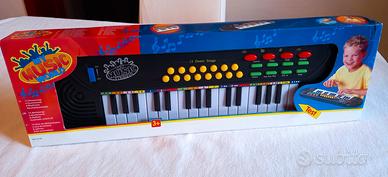 PIANOFORTE a TASTIERA ELETTRONICA con 32 tasti e..