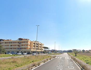 Dragona monolocale con giardino mattonato