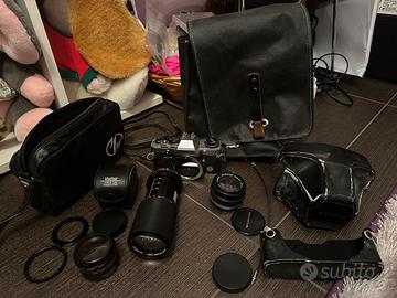 Olympus Om10 con accessori e zoom Vivitar