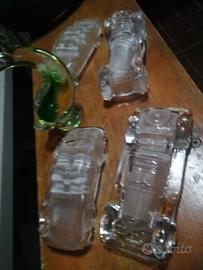 Modellini macchine e animali di vetro