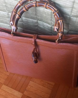 orsa vintage serapian in pelle con manici in bambù