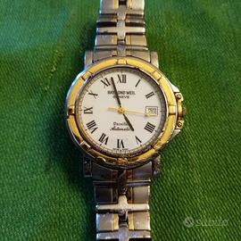 orologio oro e acciaio