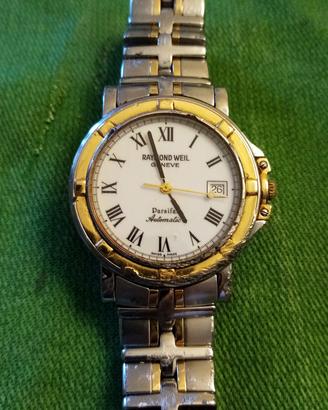 orologio oro e acciaio