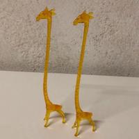 Coppia di statuine simpatiche Giraffe in plastica