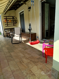 Appartamento con terrazzo, box e giardino