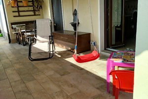 Appartamento con terrazzo, box e giardino