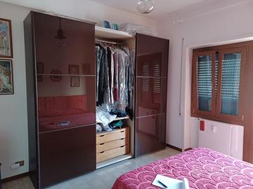 Armadio a tre ante scorrevoli