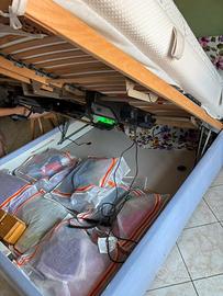 Letto contenitore con doghe motorizzate