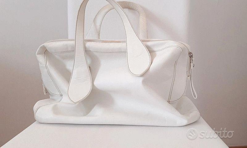 Borsa Coccinelle completamente di pelle bianco. Abbigliamento e