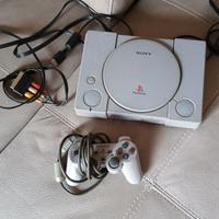 Console PlayStation 1 - PS1, con un joystick