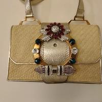 Borsa MIU MIU in raffia e pelle oro