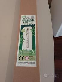metro della crescita in legno 