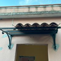 Pensilina in ferro battuto