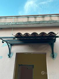 Pensilina in ferro battuto