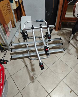 Porta bici con binario per tre bici