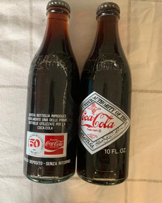 Due bottiglie commemorative cocacoka 50 anni