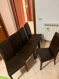 sedie in legno con copertura in pelle