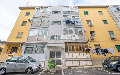 Luminoso trilocale in condominio con posto auto