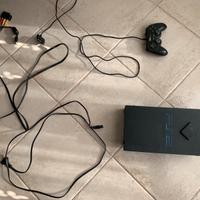 PlayStation 2 con vari giochi