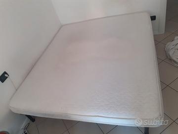 Rete e letto matrimoniale