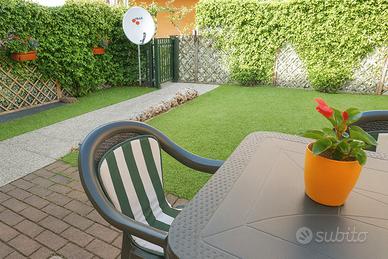 Bilocale con giardino e garage