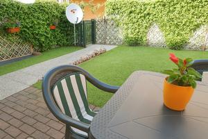 Bilocale con giardino e garage