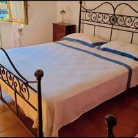 Letto matrimoniale in ferro battuto marrone